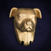Staffordshire Bull Terrier interchangeable door knocker head on a navy background, front view, folded ears and a creased brow