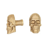 Sugar Skull brass cabinet knob and coat hook, cut out on white, one in profile showing the stem, one front on with scrollwork