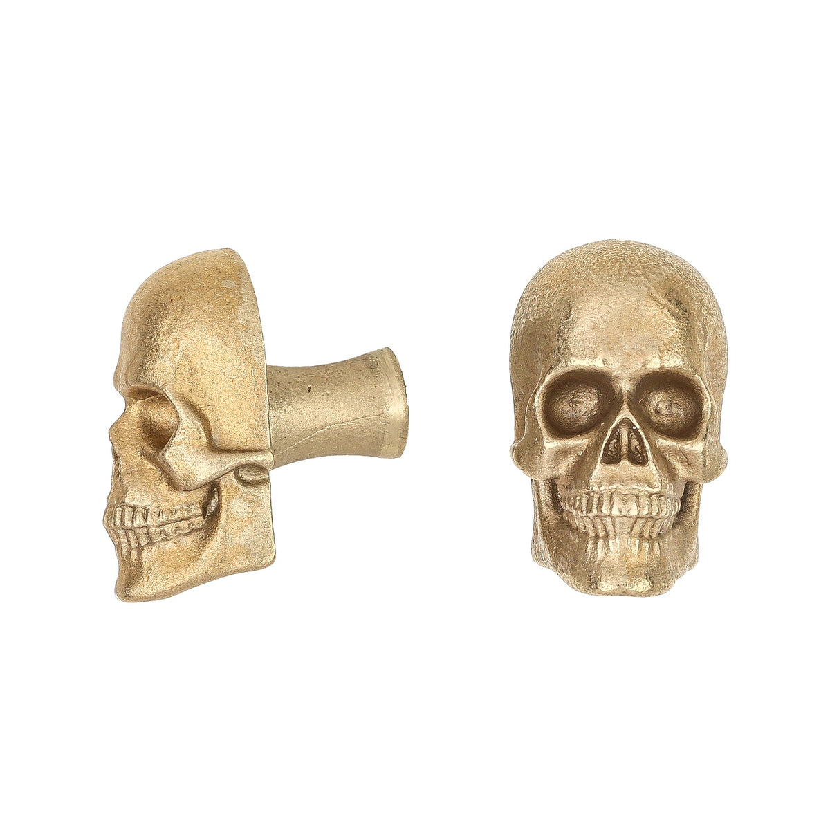 Skull brass cabinet knob and coat hook, cut out on white, one in profile showing the stem, one front on with open eye sockets